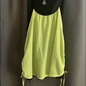 Black workout tank top with lime green mesh overlay